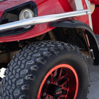 a motorcycle parked in front of a car