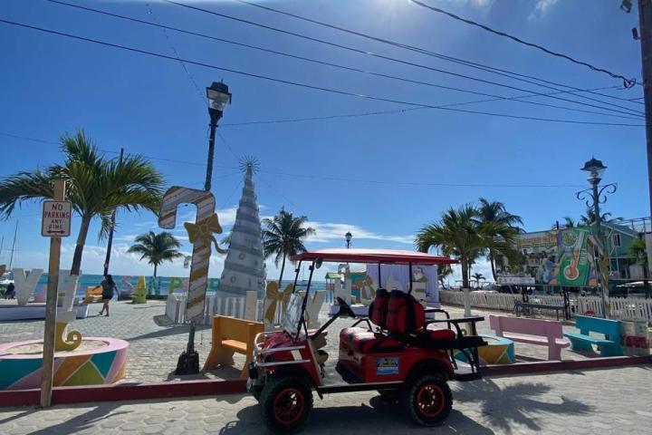 a group of people riding on the back of a truck